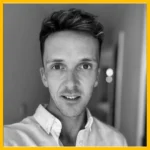 Luke Ronayne, Trustee at Technology Books for Children, in black and white portrait